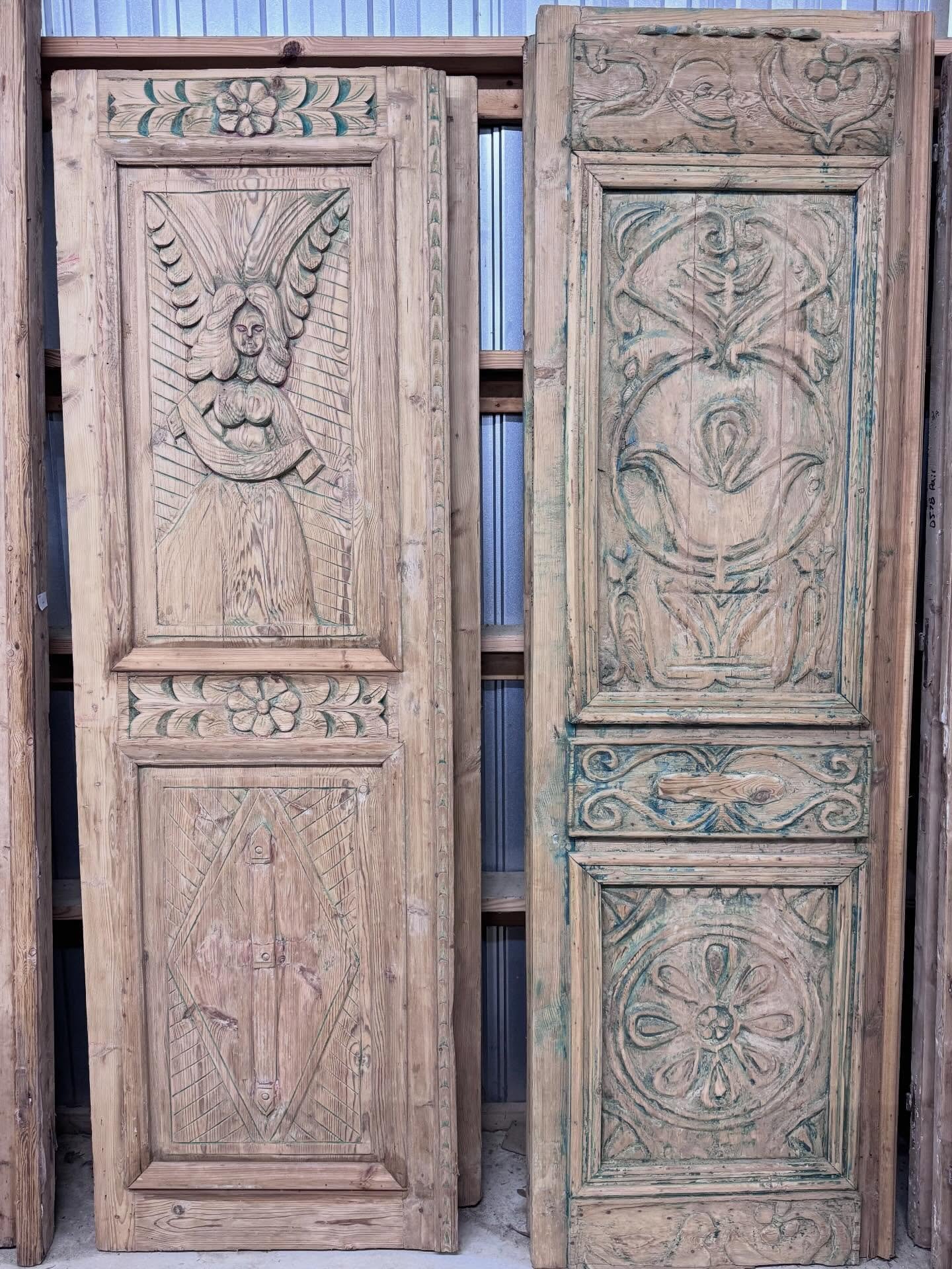 As promised. We teased these yesterday. Who needs a single door with character? Hand-carved pine doors from the French colonies. Circa 1890&rsquo;s. We have two of each shown! 

Left: 29.5&rdquo; wide by 95&rdquo; high. $1075 each (2 available) 
Righ